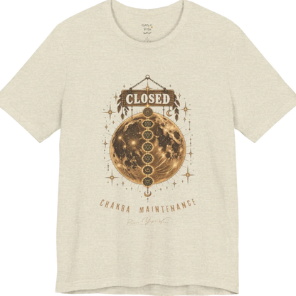 A grunge tee with a "Closed" sign hanging above a full moon, seven chakra symbols stacked down its surface, text reading "Chakra Maintenance" — Funny Yoga Shirts collection by Ramro Yoga Wear in Heather Prism Natural.