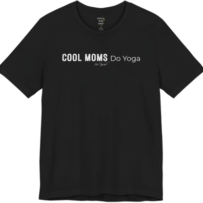 A short sleeved tee called the Moms T-Shirt, flat lay and a soft cotton shirt. Simply says, Cool Moms Do Yoga. Design highlights bold distressed block lettering for Cool Moms beside lighter thin lettering for Do Yoga, with a small script signature underneath. Color is Black.
