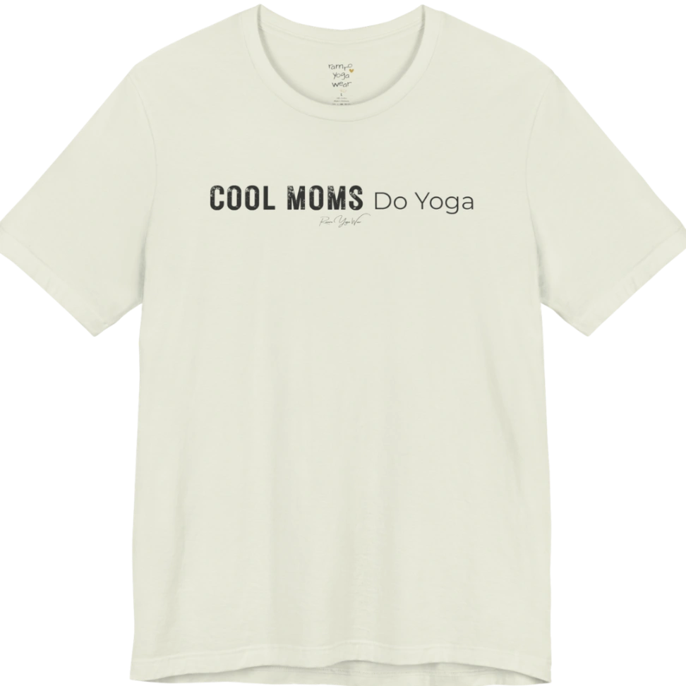 A short sleeved tee called the Moms T-Shirt, flat lay and a soft cotton shirt. Simply says, Cool Moms Do Yoga. Design highlights bold distressed block lettering for Cool Moms beside lighter thin lettering for Do Yoga, with a small script signature underneath. Color is Citron.