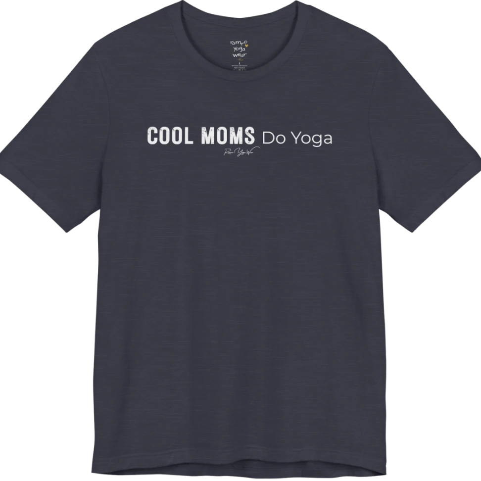 A short sleeved tee called the Moms T-Shirt, flat lay and a soft cotton shirt. Simply says, Cool Moms Do Yoga. Design highlights bold distressed block lettering for Cool Moms beside lighter thin lettering for Do Yoga, with a small script signature underneath. Color is Heather Midnight Navy.