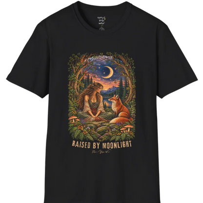 A short sleeved tee called the Moonlight T-Shirt, flat lay and a Gildan 64000 shirt. Simply says, Raised By Moonlight. Design highlights a woman sitting cross-legged in a moonlit forest clearing with a fox beside her, surrounded by mushrooms and ferns, in a full-color painted illustration style. Color is Black.
