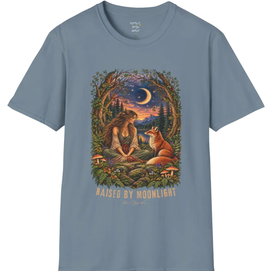 A short sleeved tee called the Moonlight T-Shirt, flat lay and a Gildan 64000 shirt. Simply says, Raised By Moonlight. Design highlights a woman sitting cross-legged in a moonlit forest clearing with a fox beside her, surrounded by mushrooms and ferns, in a full-color painted illustration style. Color is Stone Blue.