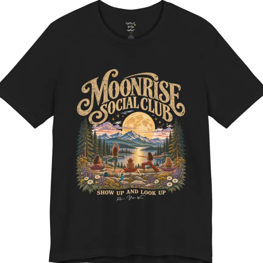 A short sleeved tee called the Moonrise T-Shirt, flat lay and a Bella+Canvas 3001. Simply says, Moonrise Social Club. Show Up And Look Up. Design highlights five women seen from behind practicing yoga on a rocky lakeside shelf, one in tree pose, one in warrior pose and three seated, beneath a glowing full moon rising over snow-capped mountains, framed by pine trees and wildflowers. Color is Black.