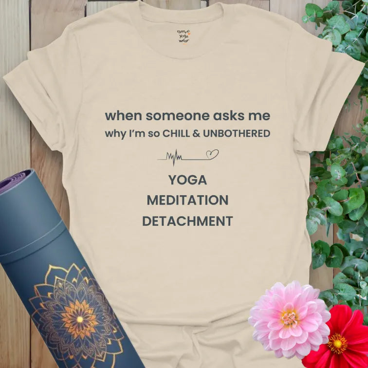Minimalist yoga quote T-shirt in natural beige with calm typography and orange heart detail.