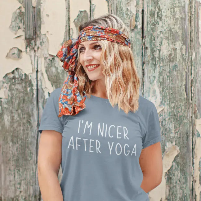 Nicer After Yoga T-Shirt lifestyle image featuring woman outdoors, showcasing playful and relatable yoga message.