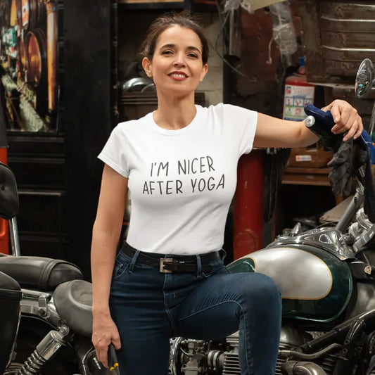 Nicer After Yoga T-Shirt lifestyle image with woman seated casually on her motor bike, highlighting relaxed post-yoga lifestyle vibe.