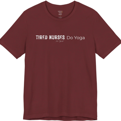 A short sleeved tee called the Nurses T-Shirt, flat lay and a soft cotton blend shirt. Simply says, Tired Nurses Do Yoga. Design highlights bold distressed block lettering for TIRED NURSES beside thin lettering for Do Yoga, with a small script signature underneath. Color is Heather Cardinal.