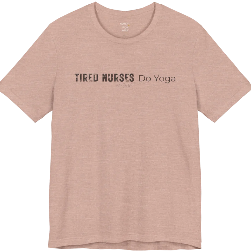 A short sleeved tee called the Nurses T-Shirt, flat lay and a soft cotton blend shirt. Simply says, Tired Nurses Do Yoga. Design highlights bold distressed block lettering for TIRED NURSES beside thin lettering for Do Yoga, with a small script signature underneath. Color is Heather Prism Peach.