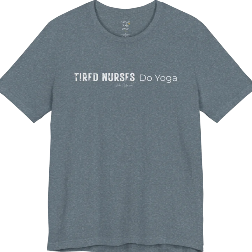 A short sleeved tee called the Nurses T-Shirt, flat lay and a soft cotton blend shirt. Simply says, Tired Nurses Do Yoga. Design highlights bold distressed block lettering for TIRED NURSES beside thin lettering for Do Yoga, with a small script signature underneath. Color is Heather Slate.