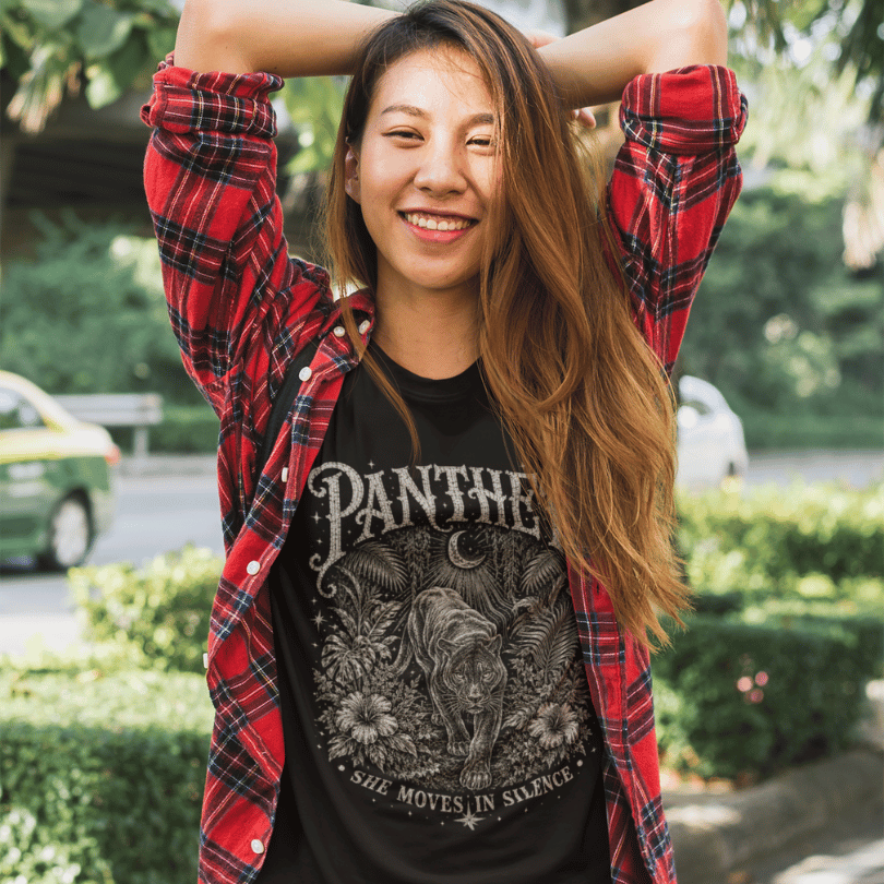 Ramro Yoga Wear Panther tee in Black — jungle panther crescent moon botanical vintage design, outdoor park lifestyle shot