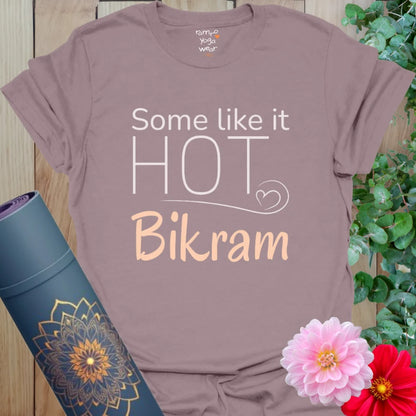 Paragon Bikram T-Shirt with “Some Like It Hot – Bikram” quote in script and block fonts. Bold yoga tee for hot flow fans.