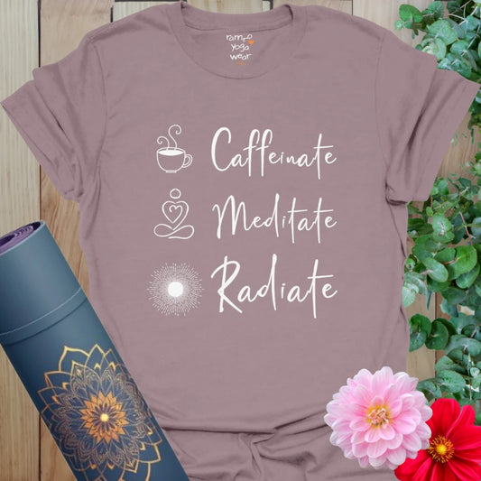 Paragon Caffeinate T-Shirt with vertical mantra: Caffeinate. Meditate. Radiate. Features minimal icon art of a coffee cup, meditation figure, and sun symbol.