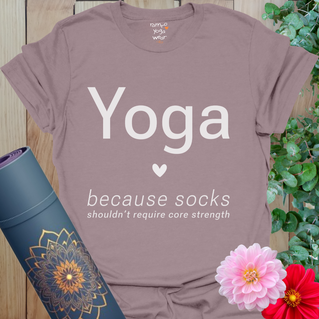 Paragon Socks T-Shirt with clean “Yoga” text, heart icon, and humorous line about socks not requiring core strength.