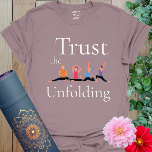 Paragon Unfolding T-Shirt with calming illustration of yoga poses and “Trust the Unfolding” mantra in elegant white type. A soothing design for deep inner peace.