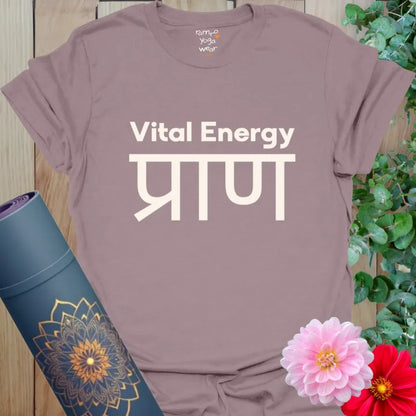 Paragon (dusty mauve) yoga tee with cream lettering, featuring Sanskrit prāṇa meaning life force. A calm and empowering design.