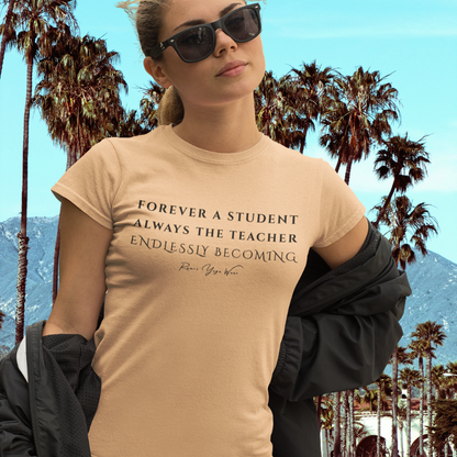 Woman wearing Path Heather Peach yoga teacher gift tee on a palm-lined street — Yoga Teacher Gifts collection by Ramro Yoga Wear