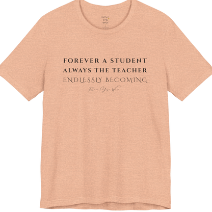 FOREVER A STUDENT ALWAYS THE TEACHER ENDLESSLY BECOMING yoga teacher gift tee flat lay in Heather Peach — Yoga Teacher Gifts collection by Ramro Yoga Wear