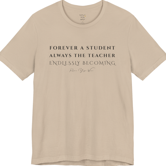 FOREVER A STUDENT ALWAYS THE TEACHER ENDLESSLY BECOMING yoga teacher gift tee flat lay in Tan — Yoga Teacher Gifts collection by Ramro Yoga Wear