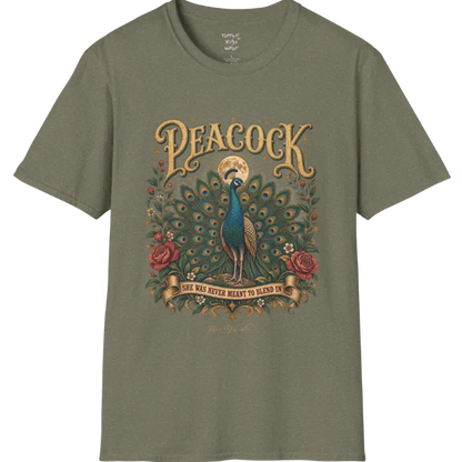 A short sleeved tee, illustration of a Peacock with full tail fan beneath a glowing moon, full-color vintage poster art with "She Was Never Meant To Blend In" banner — Wild Animals collection by Ramro Yoga Wear in Heather Military Green.