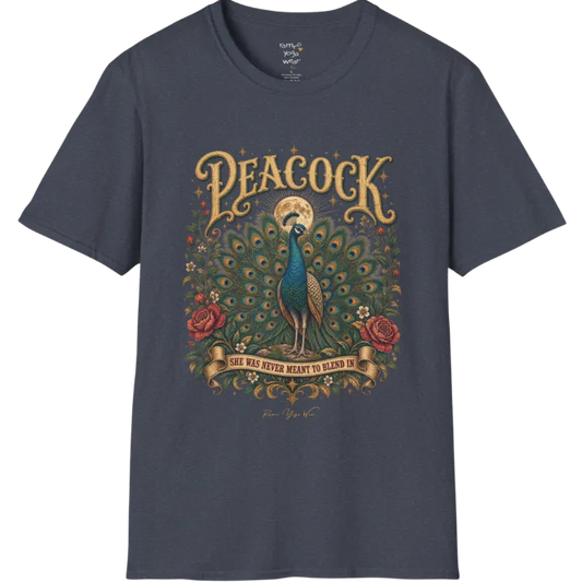 A short sleeved tee, illustration of a Peacock with full tail fan beneath a glowing moon, full-color vintage poster art with "She Was Never Meant To Blend In" banner — Wild Animals collection by Ramro Yoga Wear in Heather Navy.
