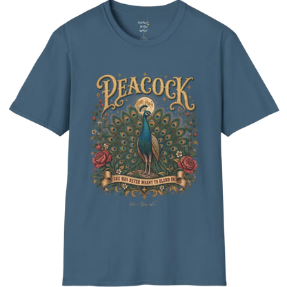 A short sleeved tee, illustration of a Peacock with full tail fan beneath a glowing moon, full-color vintage poster art with "She Was Never Meant To Blend In" banner — Wild Animals collection by Ramro Yoga Wear in Indigo Blue.