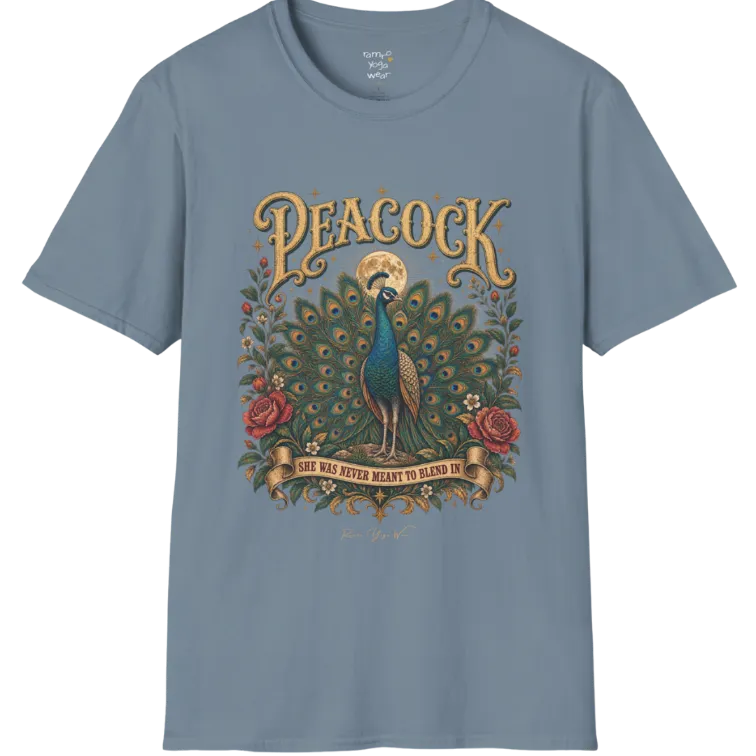 A short sleeved tee, illustration of a Peacock with full tail fan beneath a glowing moon, full-color vintage poster art with "She Was Never Meant To Blend In" banner — Wild Animals collection by Ramro Yoga Wear in Stone Blue.