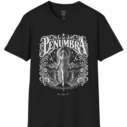 A short sleeved tee called the Penumbra T-Shirt, flat lay and a Gildan 64000 shirt. Simply says, Not Everything Is Fully Lit. Design highlights a moon goddess bathed in radiant light against a mountain backdrop, framed in ornate vintage lettering with botanical detailing. Color is Black.