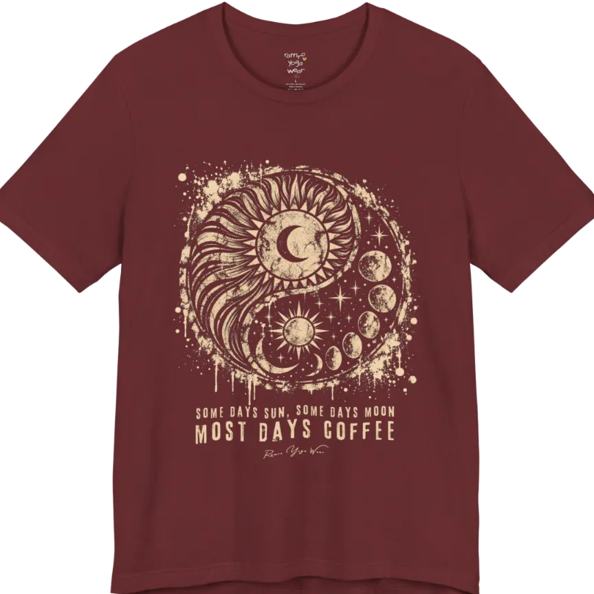 A short sleeved tee called the Phases T-Shirt, flat lay and a Bella+Canvas 3001 shirt. Simply says, Some Days Sun, Some Days Moon, Most Days Coffee. Design highlights a grunge yin yang made of a radiating sun and a tail of moon phases, with stars and ink splatter. Color is Heather Cardinal.