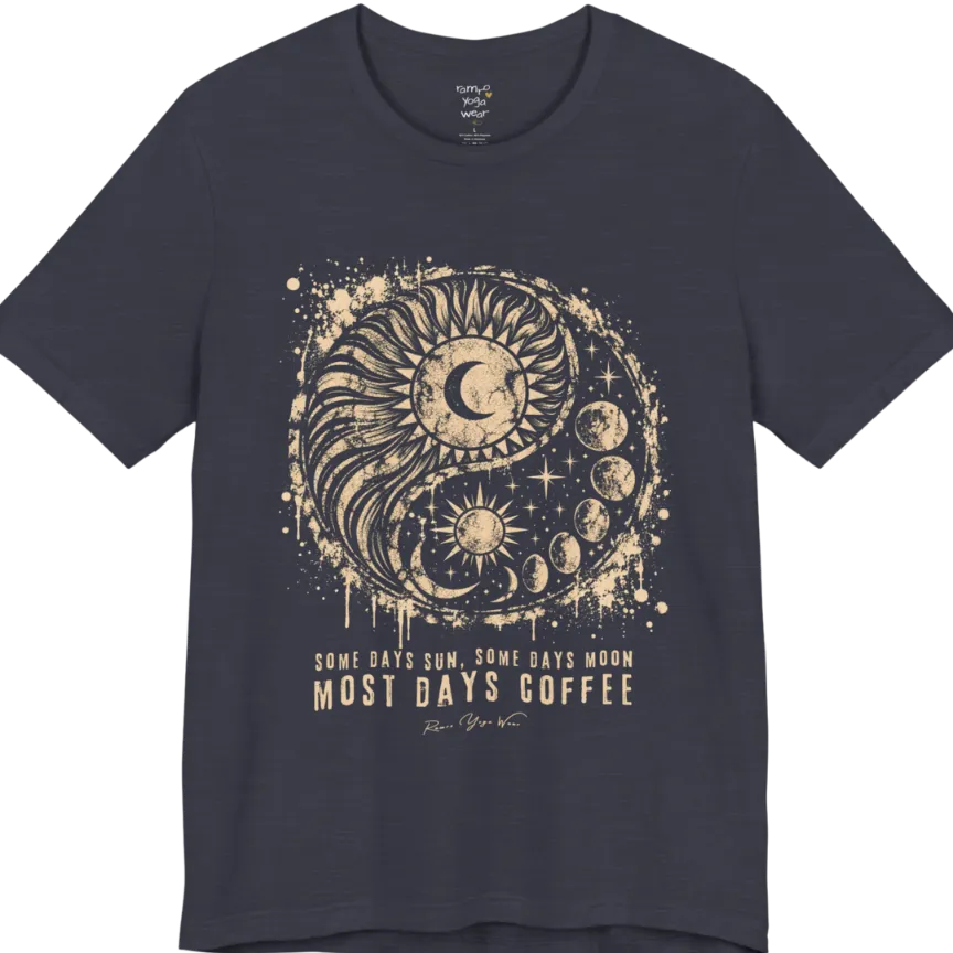 A short sleeved tee called the Phases T-Shirt, flat lay and a Bella+Canvas 3001 shirt. Simply says, Some Days Sun, Some Days Moon, Most Days Coffee. Design highlights a grunge yin yang made of a radiating sun and a tail of moon phases, with stars and ink splatter. Color is Heather Midnight Navy.