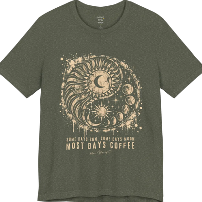 A short sleeved tee called the Phases T-Shirt, flat lay and a Bella+Canvas 3001 shirt. Simply says, Some Days Sun, Some Days Moon, Most Days Coffee. Design highlights a grunge yin yang made of a radiating sun and a tail of moon phases, with stars and ink splatter. Color is Heather Military Green.