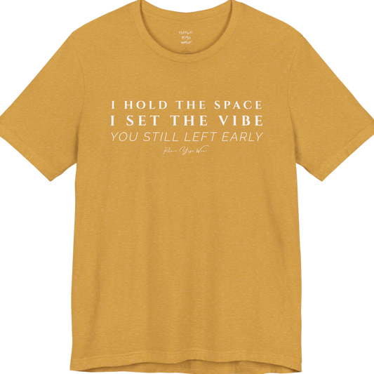 I HOLD THE SPACE I SET THE VIBE YOU STILL LEFT EARLY yoga teacher gift tee flat lay in Heather Mustard — Yoga Teacher Gifts collection by Ramro Yoga Wear