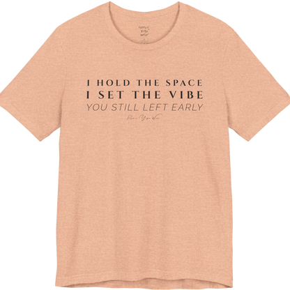 I HOLD THE SPACE I SET THE VIBE YOU STILL LEFT EARLY yoga teacher gift tee flat lay in Heather Peach — Yoga Teacher Gifts collection by Ramro Yoga Wear