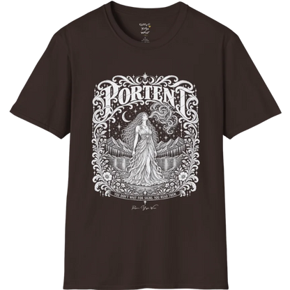 A short sleeved tee called the Portent T-Shirt, flat lay and a soft cotton shirt. Simply says, You don't wait for signs. You read them. Design highlights an ornate engraved frame of florals and filigree around a long-haired figure in a flowing gown standing before mountains and still water, with a crescent moon, stars and swirling smoke above and Portent in decorative lettering across the top. Color is Dark Chocolate.