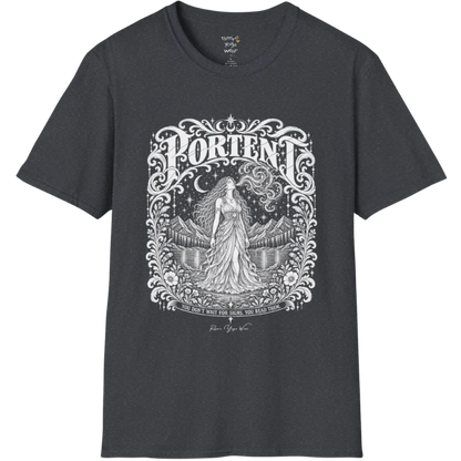 A short sleeved tee called the Portent T-Shirt, flat lay and a soft cotton shirt. Simply says, You don't wait for signs. You read them. Design highlights an ornate engraved frame of florals and filigree around a long-haired figure in a flowing gown standing before mountains and still water, with a crescent moon, stars and swirling smoke above and Portent in decorative lettering across the top. Color is Dark Heather Grey.