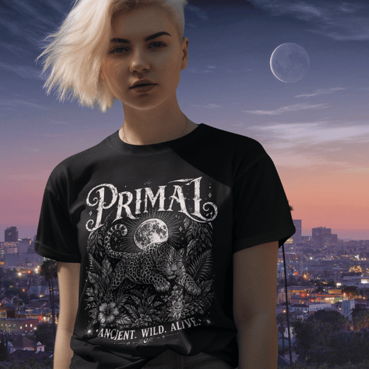 Primal T-Shirt lifestyle image featuring relaxed spiritual streetwear styling with vintage mystical artwork in a calm earthy setting.