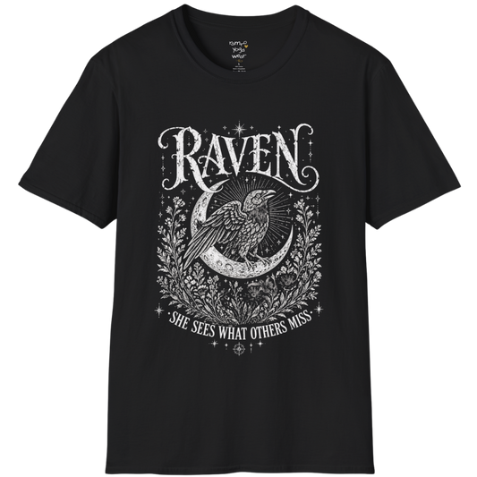 Black Raven T-Shirt featuring mystical raven artwork with moon phases, celestial detailing, and vintage-inspired spiritual illustration styling