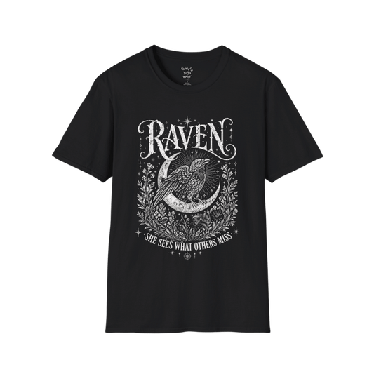 Black Raven T-Shirt featuring mystical raven artwork with moon phases, celestial detailing, and vintage-inspired spiritual illustration styling.