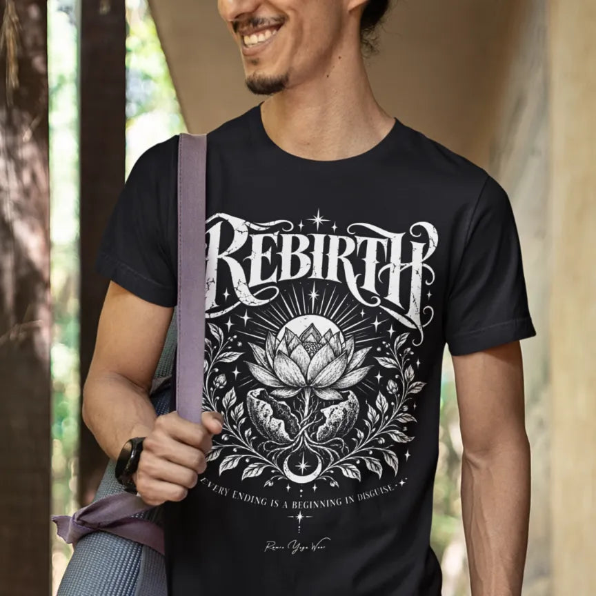 A smiling man carries a rolled yoga mat over his shoulder in a sunlit covered walkway, wearing the Rebirth T-Shirt. Rebirth T-Shirt is a Gildan 64000 and the color is Black. 