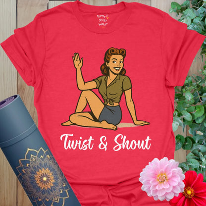 Bold red yoga t-shirt with fun pinup yogi twist design and vintage-inspired script.