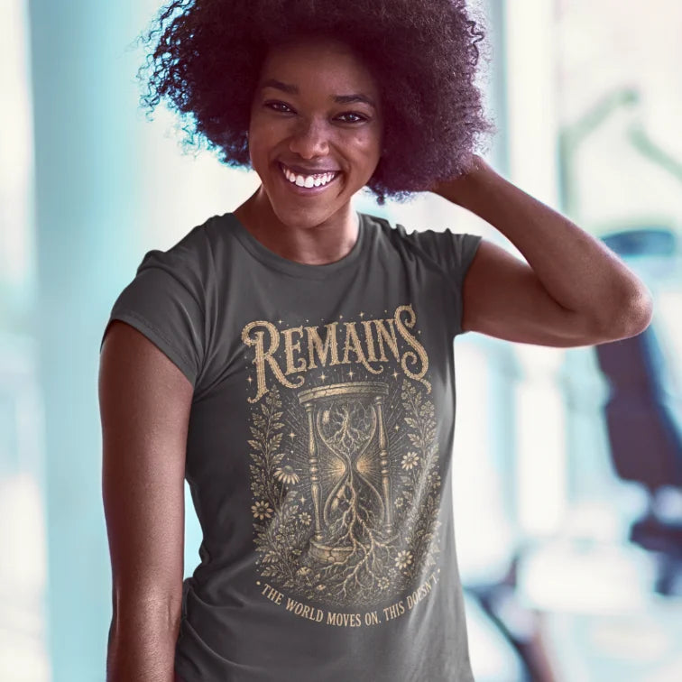 Person wearing Remains dark heather grey sacred yoga shirt carrying a yoga mat outdoors — Sacred Thread collection by Ramro Yoga Wear