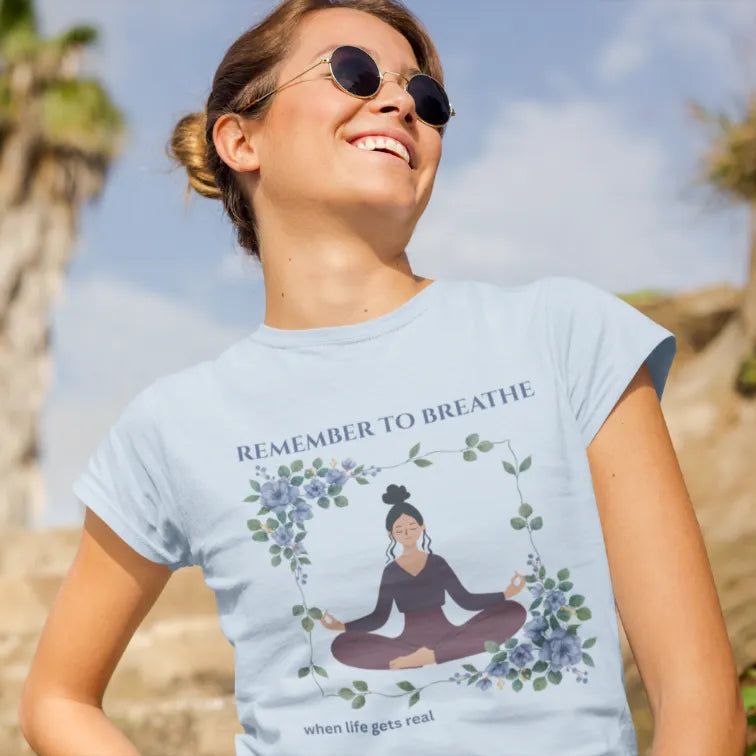 Remember To Breathe T-Shirt color sky featuring woman in natural light. Everyday yoga wear with calm, effortless energy.