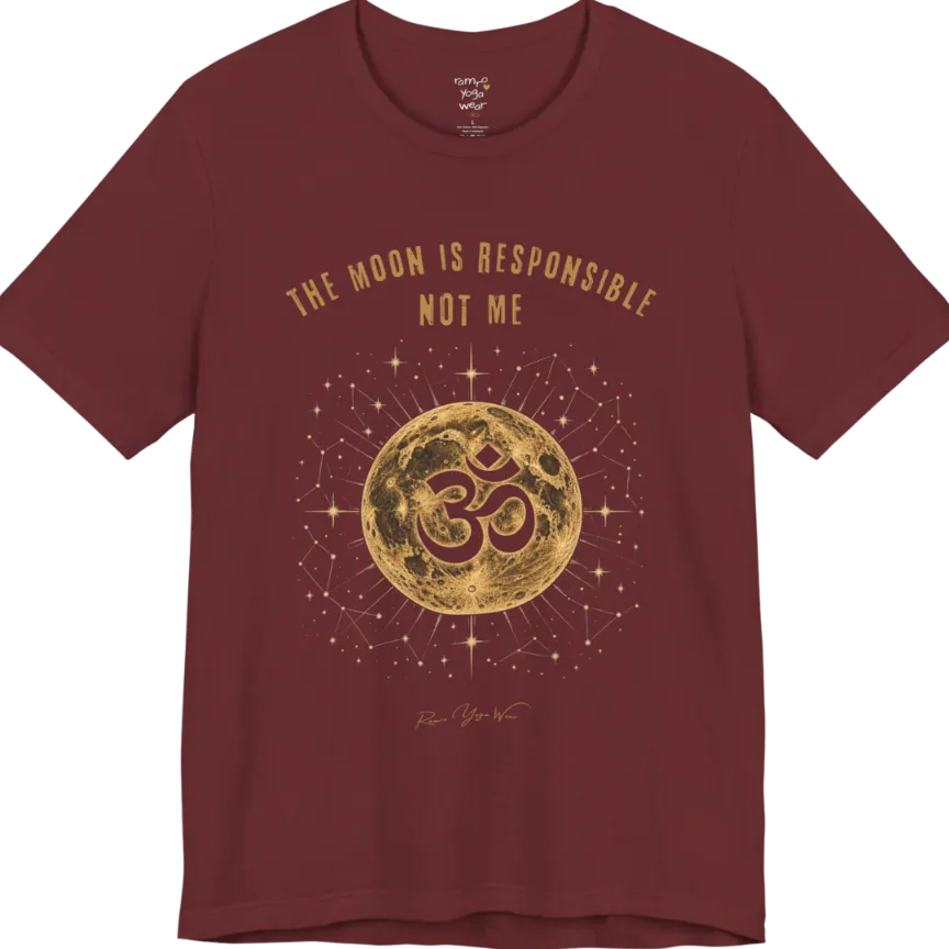 A short sleeved teed with a design of a Full moon with gold constellation detail and a negative-space Om cutout, "The Moon Is Responsible, Not Me" design — Funny Yoga Shirts collection by Ramro Yoga Wear and in Heather Cardinal 