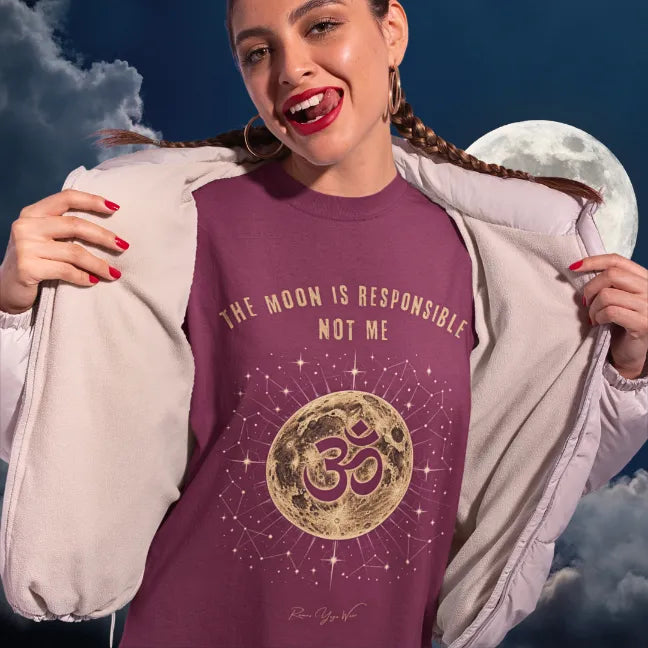 Person wearing Responsible Heather Cardinal tee, smiling and holding open a jacket outdoors with the moon visible — Funny Yoga Shirts collection by Ramro Yoga Wear