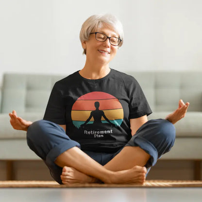 Retirement T-Shirt featuring relaxed yoga moment indoors. Soft, mindful tee styled for calm and comfort.
