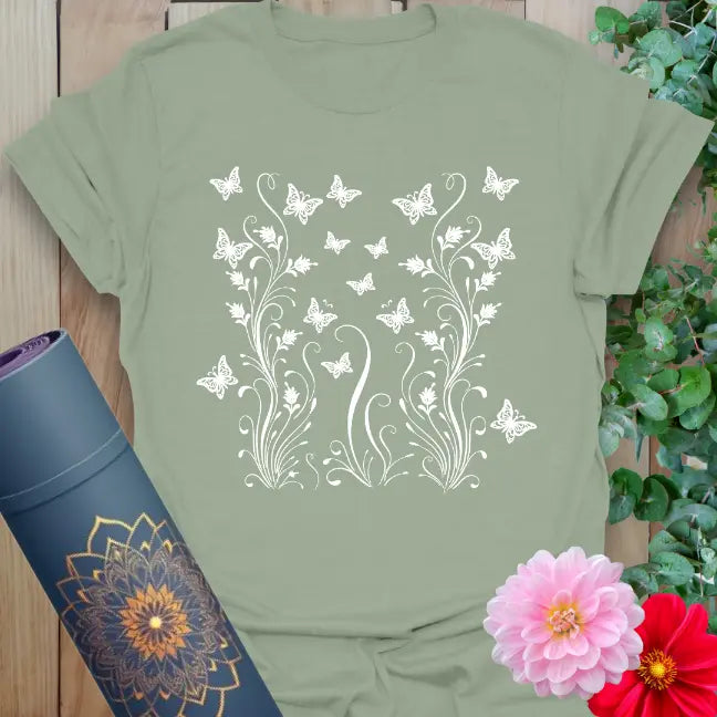 age green yoga tee with white butterfly and vine design for mindful movement