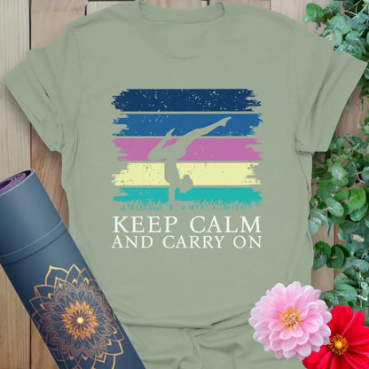 Sage green t-shirt with vibrant yoga pose art and “Keep Calm” mantra