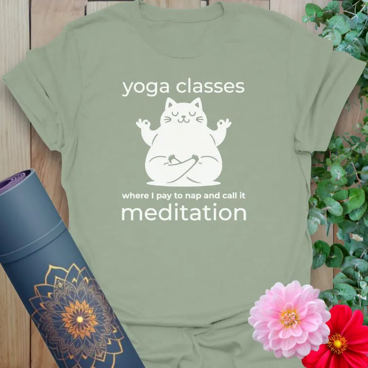 Sage green t-shirt with cute yoga cat and napping joke design