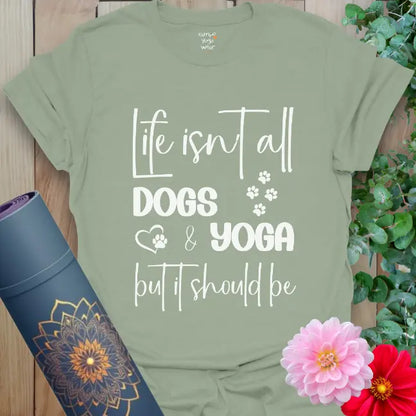 Sage green yoga tee with funny "Life isn't all dogs and yoga" saying and paws