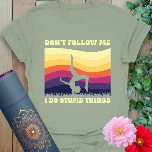 Sage green yoga t-shirt with retro sunset background and funny "Don't Follow Me" quote