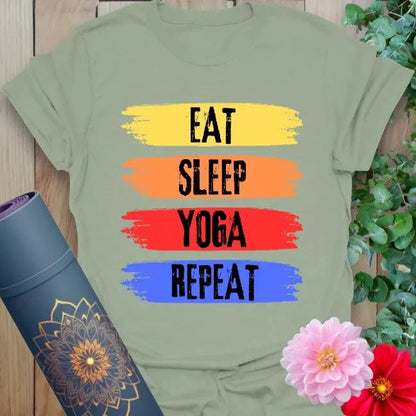 Sage green yoga tee with "Eat Sleep Yoga Repeat" colorful brushstroke art